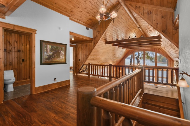 686 Lake Dr, Morganton, GA 30560 - hallway featuring wood walls, a notable chandelier, vaulted ceiling with beams, wood ceiling, and dark hardwood / wood-style floors