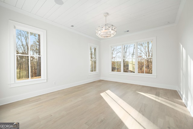 unfurnished dining area with crown molding, a chandelier, light hardwood / wood-style floors, and wooden ceiling