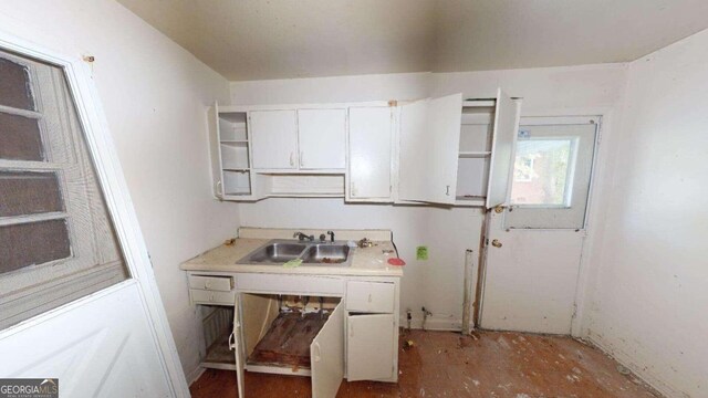 kitchen with white cabinets and sink