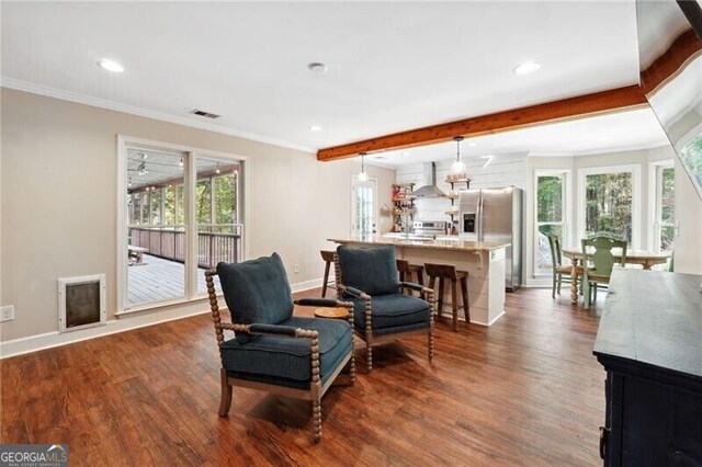 living room featuring beamed ceiling, crown molding, and dark wood-type flooring