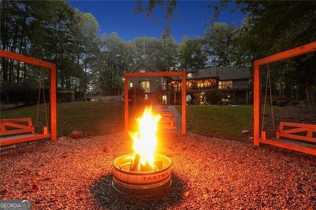 exterior space with an outdoor fire pit