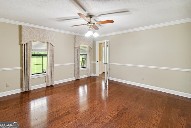 spare room featuring dark hardwood / wood-style floors, ceiling fan, a textured ceiling, and ornamental molding