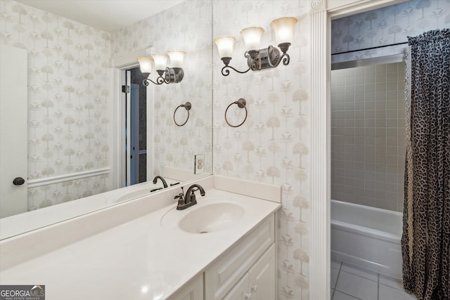 bathroom with vanity, tile floors, and shower / bathtub combination