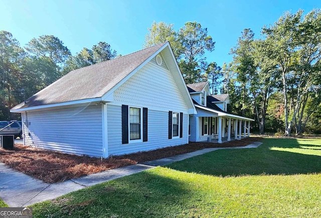 view of home's exterior with a lawn