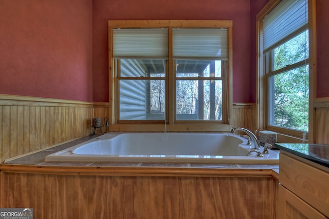 bathroom featuring a washtub