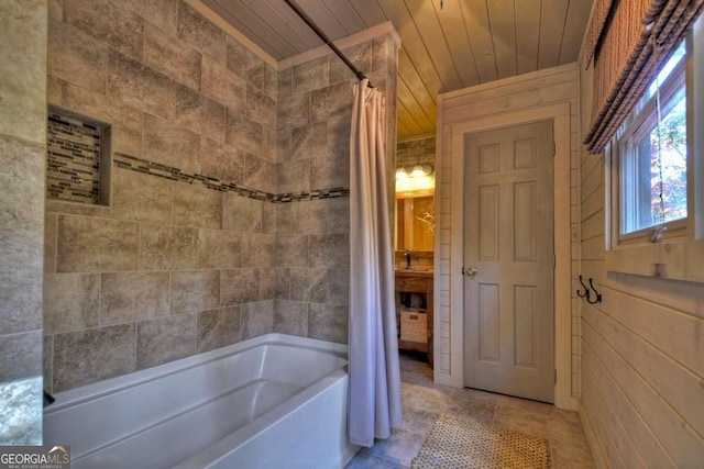 bathroom featuring shower / tub combo with curtain and wooden ceiling