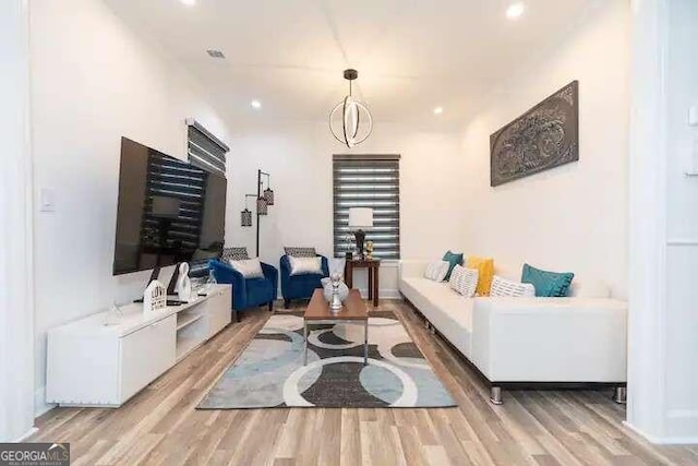 living room with light hardwood / wood-style floors