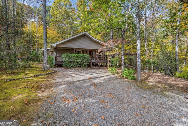 view of side of property with a deck