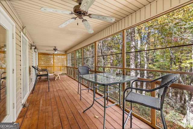 wooden deck with ceiling fan