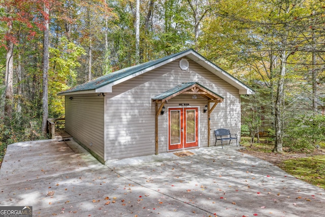 view of outdoor structure with french doors