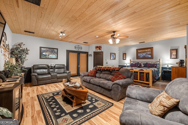 living room featuring french doors, wood ceiling, ceiling fan, and light wood-type flooring