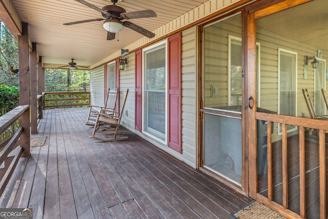 wooden deck with ceiling fan