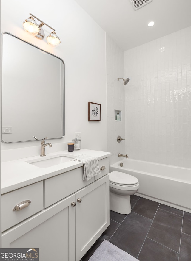 spare room featuring a wealth of natural light and dark hardwood / wood-style floors