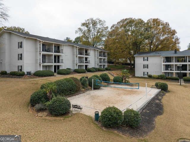 view of property's community featuring volleyball court