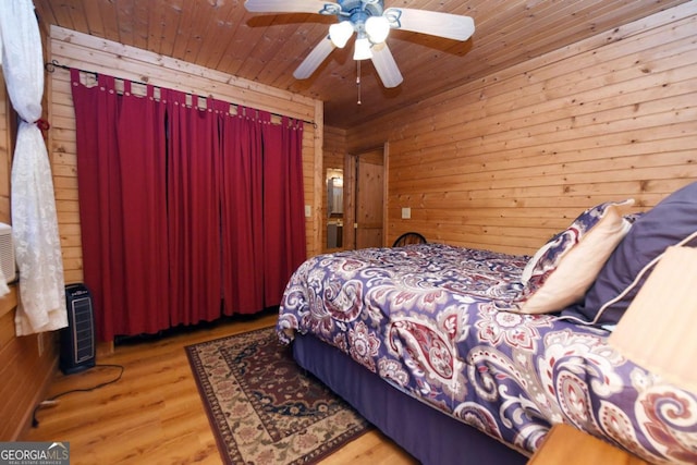 bedroom featuring wood ceiling, ceiling fan, and hardwood / wood-style floors