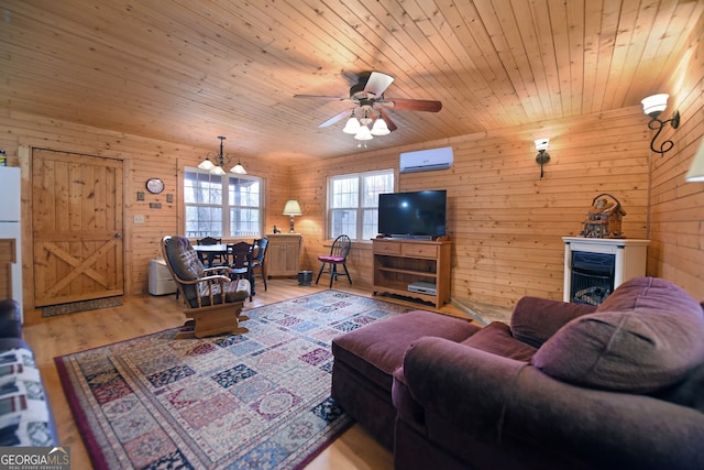 living room with wooden ceiling, hardwood / wood-style floors, wooden walls, and ceiling fan with notable chandelier