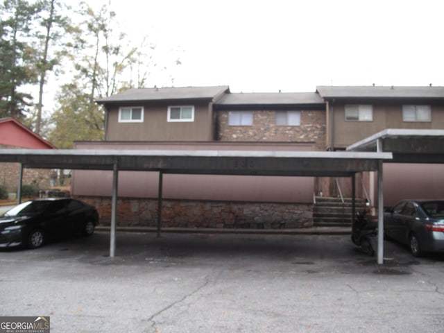 view of parking featuring a carport