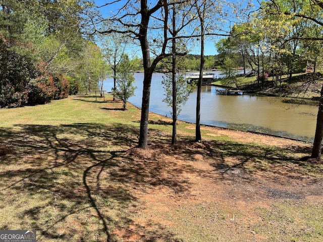 view of yard with a water view