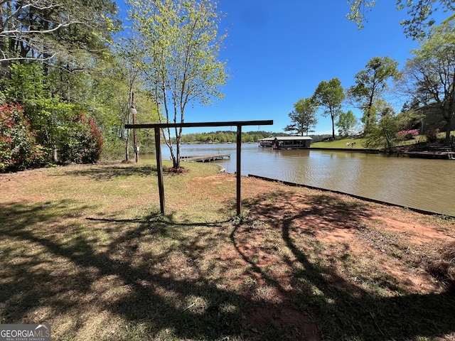 property view of water featuring a dock