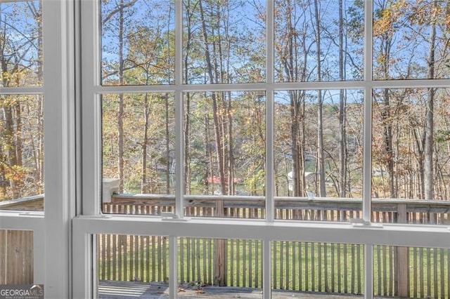 unfurnished sunroom with plenty of natural light