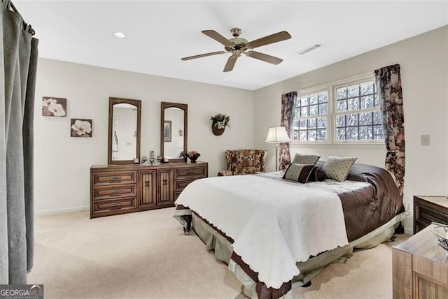 carpeted bedroom with ceiling fan