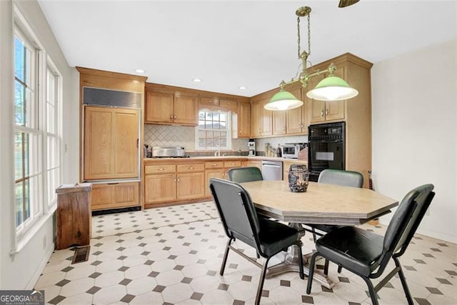 dining area featuring sink