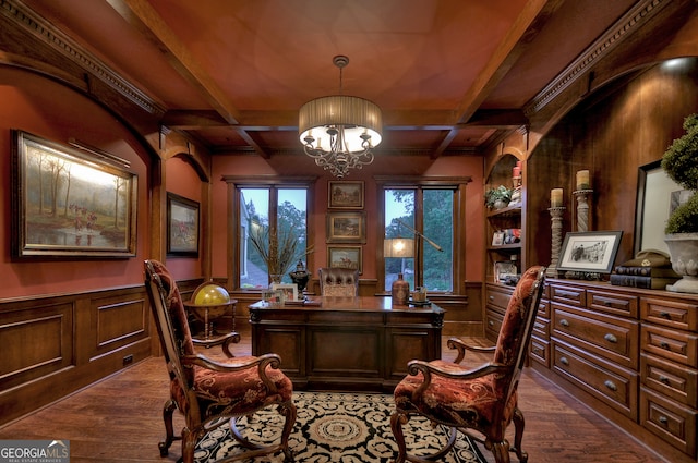 home office with dark hardwood / wood-style flooring, an inviting chandelier, coffered ceiling, and beam ceiling