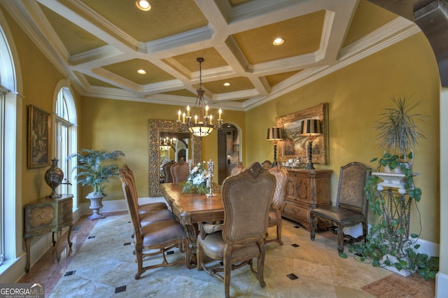 dining space with ornamental molding, coffered ceiling, and a notable chandelier