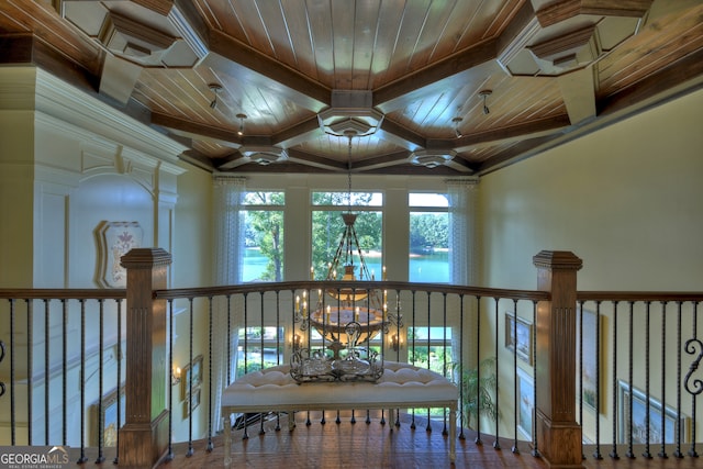 interior space featuring beam ceiling, crown molding, and wooden ceiling