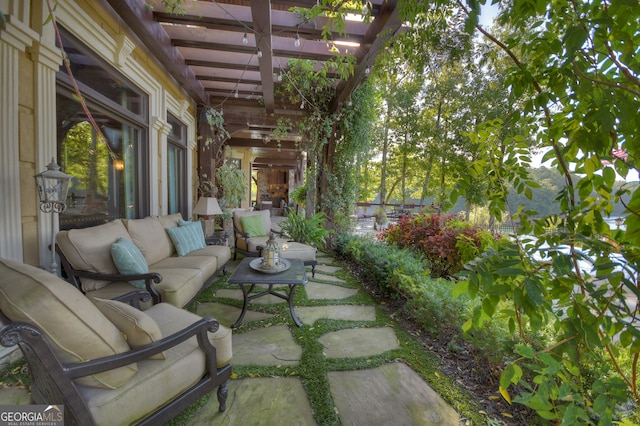 view of patio featuring a pergola and an outdoor hangout area