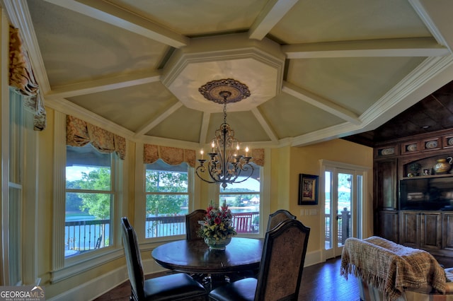 dining room featuring hardwood / wood-style floors, lofted ceiling with beams, plenty of natural light, and a notable chandelier