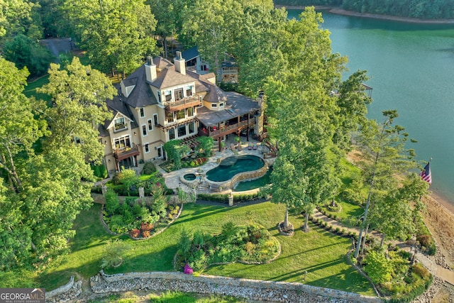 birds eye view of property featuring a water view