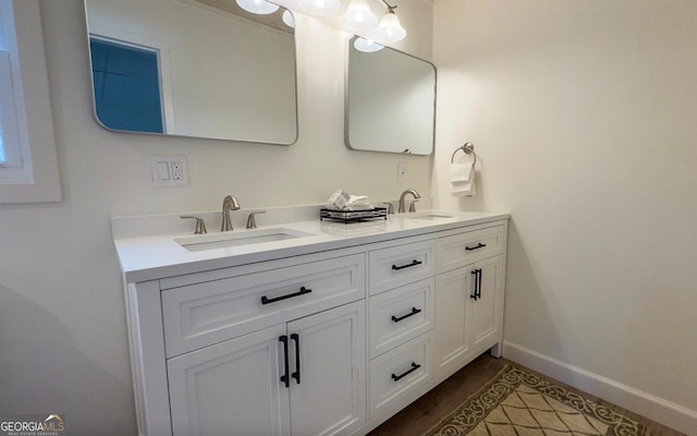 bathroom with double sink and large vanity