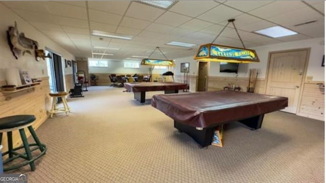 recreation room with a paneled ceiling, pool table, and carpet