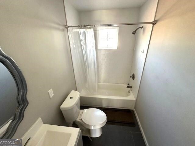 full bathroom with toilet, vanity, tile patterned floors, and shower / bath combination with curtain