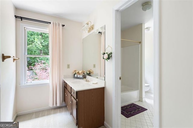 full bathroom featuring vanity, toilet, and tub / shower combination