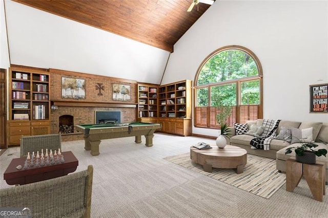 rec room with high vaulted ceiling, light carpet, a fireplace, wood ceiling, and pool table