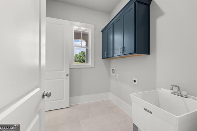 170 Ewing Way, Dacula, GA 30019 - washroom featuring hookup for a washing machine, hookup for an electric dryer, cabinet space, and light tile patterned floors