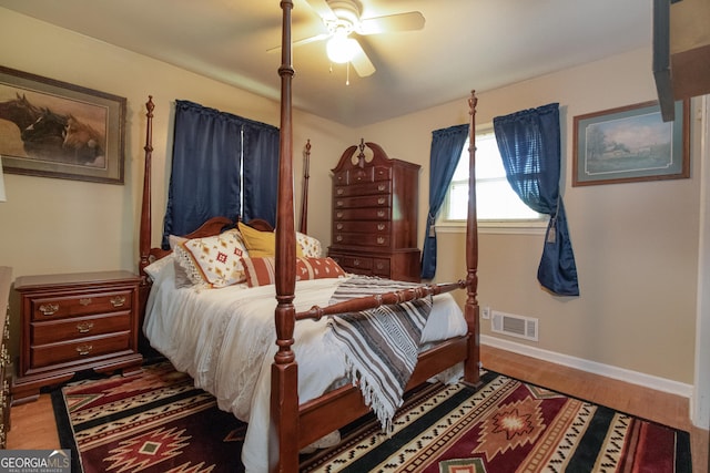 bedroom featuring ceiling fan and wood-type flooring