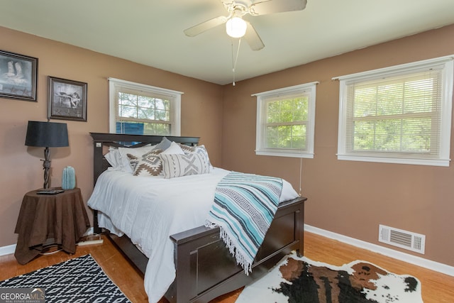 bedroom featuring ceiling fan and light wood-type flooring