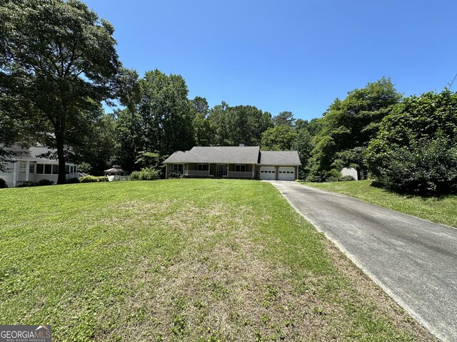 ranch-style home with a front yard