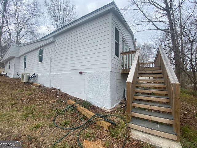 view of home's exterior with a deck