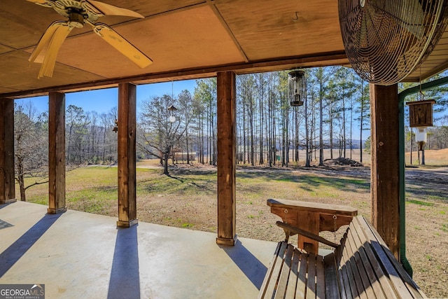 view of patio featuring ceiling fan