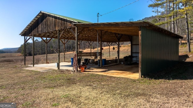 view of parking / parking lot with a carport