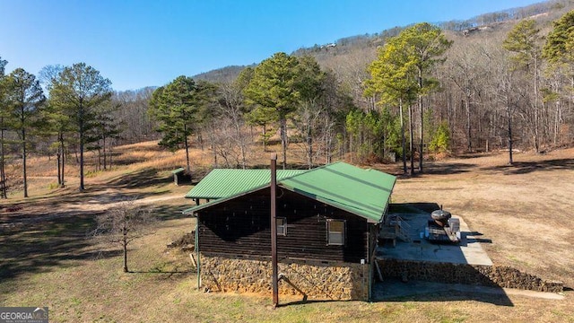 view of home's community featuring a mountain view and a rural view