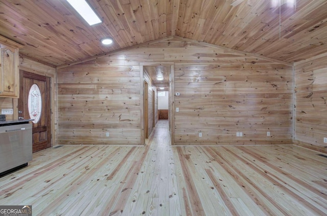 bonus room with light hardwood / wood-style floors, vaulted ceiling, wood ceiling, and wooden walls