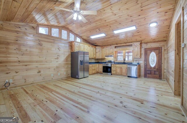 kitchen featuring plenty of natural light, light hardwood / wood-style flooring, appliances with stainless steel finishes, and wood ceiling