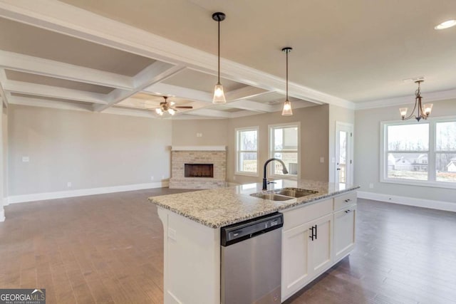 kitchen featuring stainless steel dishwasher, dark wood-type flooring, an island with sink, sink, and white cabinets