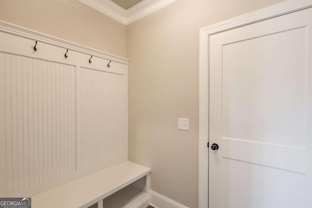 mudroom featuring ornamental molding