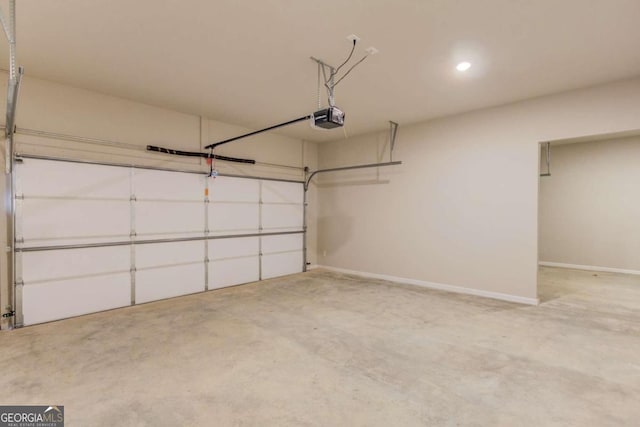 garage featuring a garage door opener